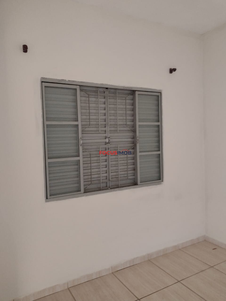 Casa na Vila São Carlos -Mogi Guaçu com edícula .