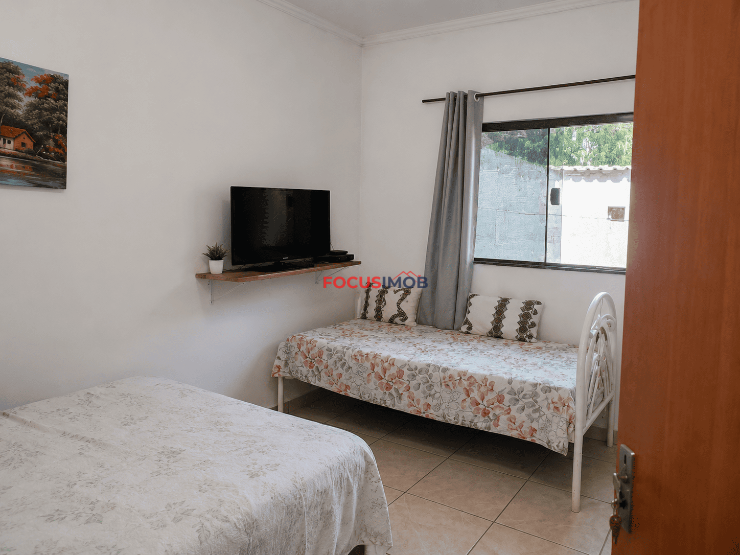 Casa com 2 Dormitórios, Churrasqueira e 2 Vagas de Garagem à Venda – 88 m²