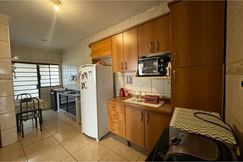 Casa com Três Dormitórios