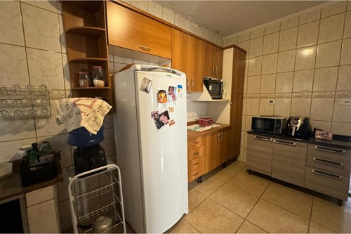 Casa com Três Dormitórios